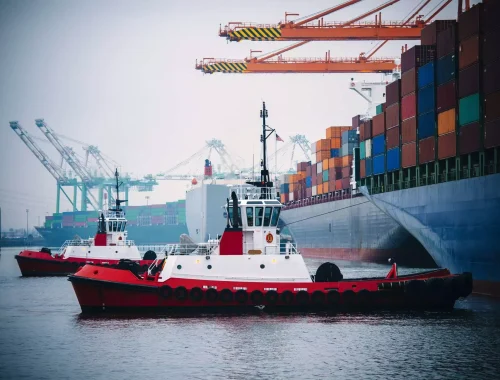 container-ship-and-tugboats-in-harbor-tacoma-was-2023-11-27-05-26-09-utc-min-2048x1363-1.webp